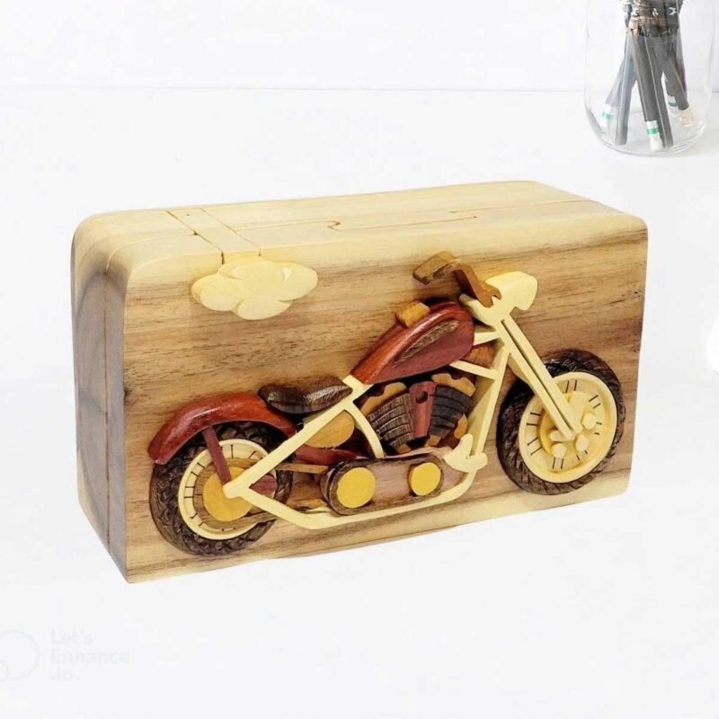 A wooden puzzle box with intricate carvings.